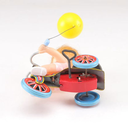 Vintage Made in Japan Wind-Up Girl on Tricycle Tin Toy with Balloon & Bell