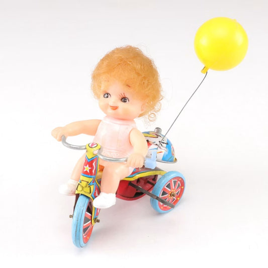 Vintage Made in Japan Wind-Up Girl on Tricycle Tin Toy with Balloon & Bell